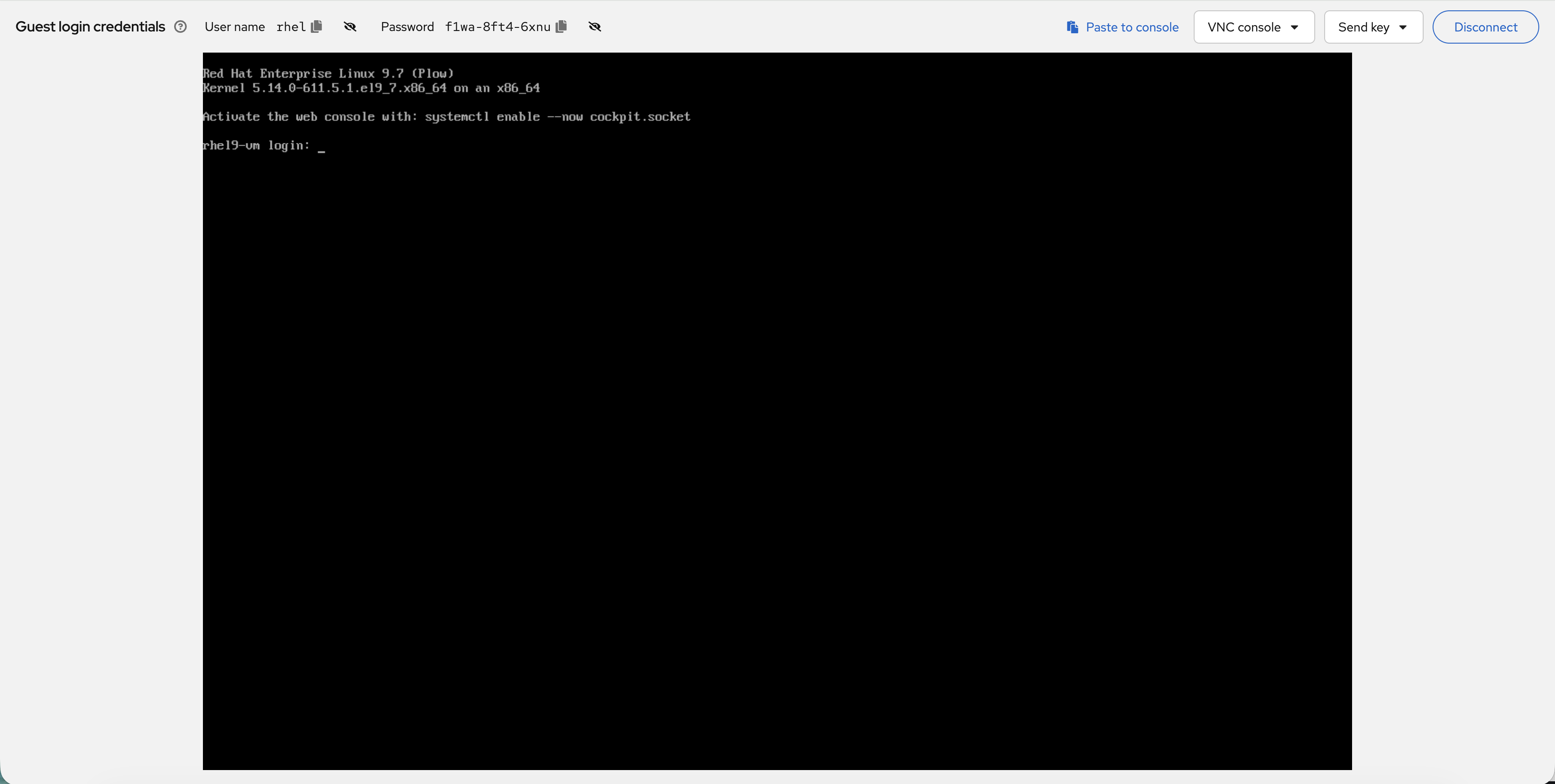VNC console with guest credentials shown at top
